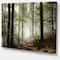 Designart - Light in Dense Fall Forest with Fog - Landscape Art Print Canvas